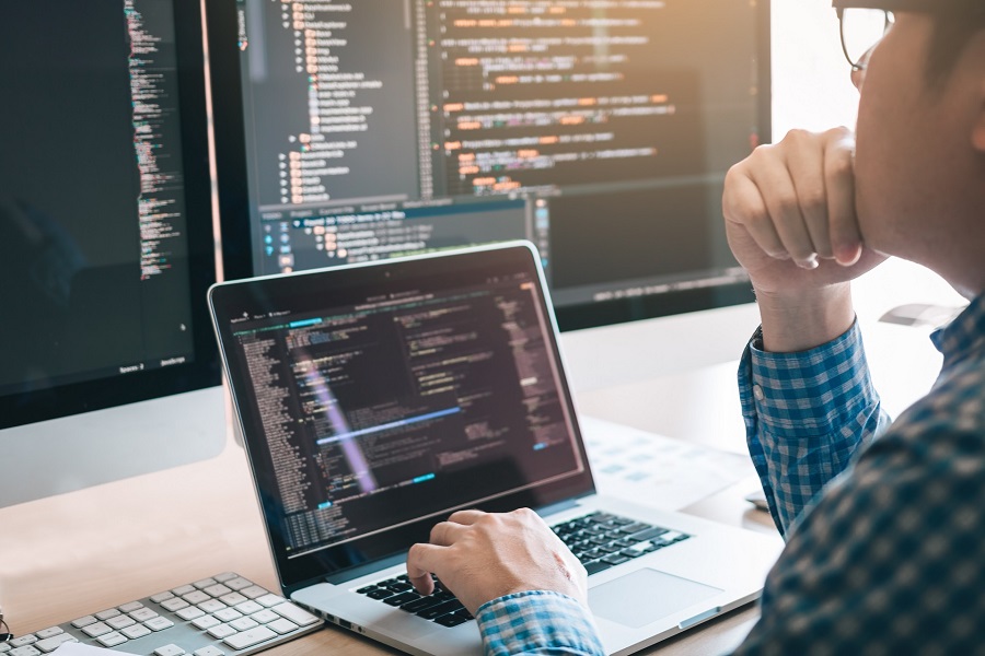 A web developer writing code for a website