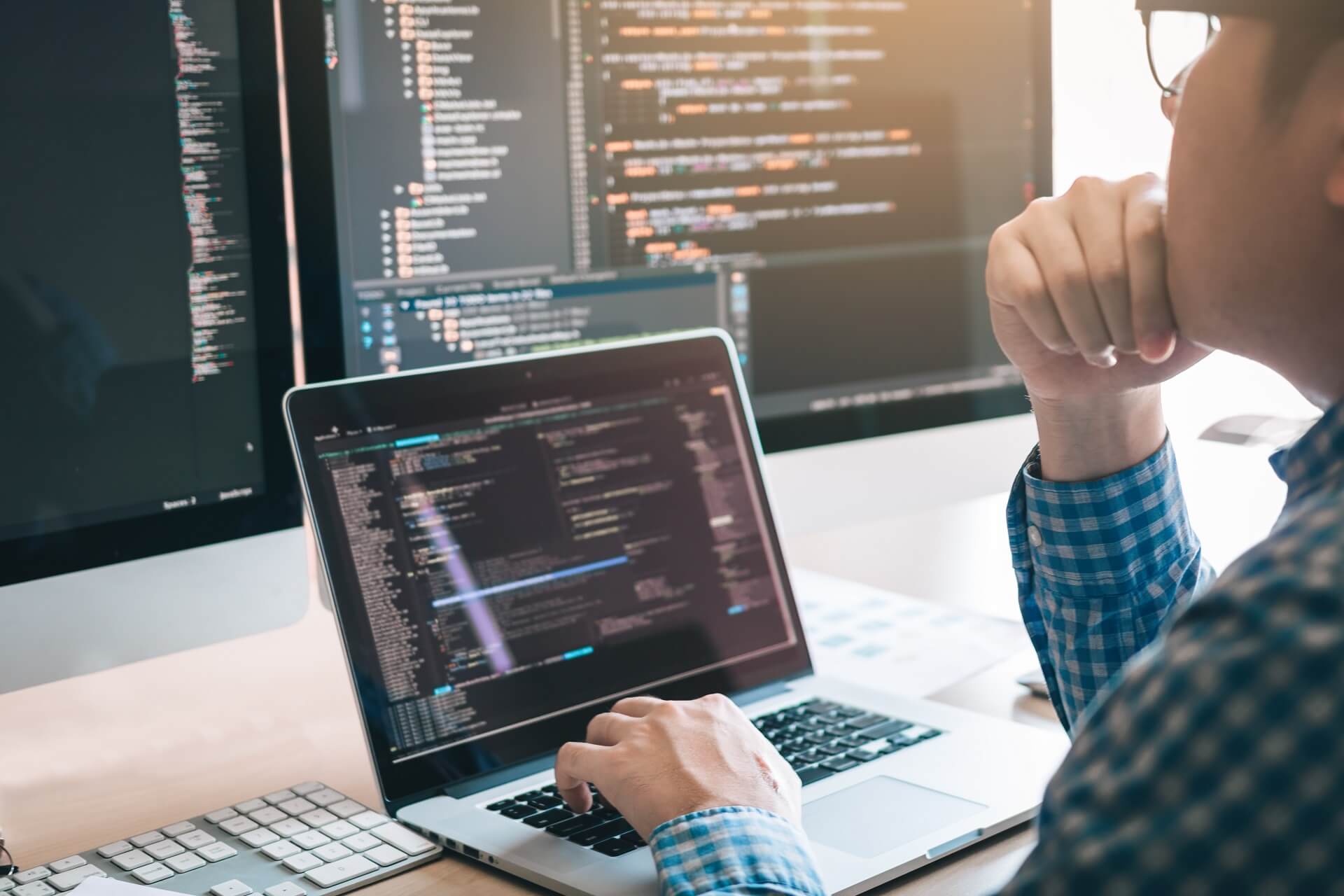 A web developer writing code for a website