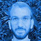 A photo of Phil Warner with a blue tint